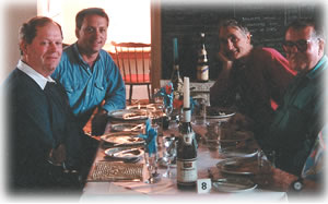 Tour members share the days finds and stories as they enjoy their dinner